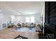 Bright living room with stylish decor and comfortable seating opens to dining and kitchen at 1757 Ashcroft Ln, Rock Hill, SC 29732