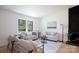Bright, spacious living room with large window and comfortable seating arrangement at 1757 Ashcroft Ln, Rock Hill, SC 29732
