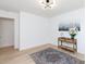 Spacious living room with an area rug, console table and a decorative floral arrangement, bathed in natural light at 1757 Ashcroft Ln, Rock Hill, SC 29732