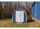 The blue and white shed is located to the side of a blue house at 1757 Ashcroft Ln, Rock Hill, SC 29732