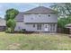 This home has a nice patio, fenced backyard, and a gray exterior at 183 Bellelaine Dr, Mooresville, NC 28115