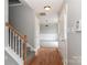 Bright entryway with hardwood floors, carpeted stairs, and neutral paint at 183 Bellelaine Dr, Mooresville, NC 28115
