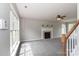 Spacious living room with neutral carpet, a fireplace, and natural light at 183 Bellelaine Dr, Mooresville, NC 28115