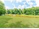 This outdoor pond features a fountain and grassy area at 183 Bellelaine Dr, Mooresville, NC 28115