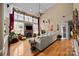 Spacious living room features a cozy fireplace, hardwood floors, and vaulted ceilings for an airy feel at 1900 Birchbrook Ct, Harrisburg, NC 28075