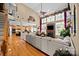 Bright, open living room boasts a soaring ceiling, a fireplace, and seamless flow to the kitchen at 1900 Birchbrook Ct, Harrisburg, NC 28075