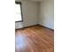 Comfortable bedroom with hardwood floors and a window with natural light at 2030 Keisler Dairy Rd, Conover, NC 28613
