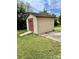 Small outdoor storage building with double doors on a grassy area at 2030 Keisler Dairy Rd, Conover, NC 28613