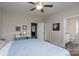 Spacious bedroom featuring neutral walls, a ceiling fan, and an ensuite bathroom at 2205 Philadelphia Church Rd, Dallas, NC 28034