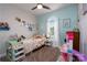 Bright and cheery bedroom filled with natural light and colorful decor at 2205 Philadelphia Church Rd, Dallas, NC 28034