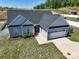 Charming single-Gathering home features a two-car garage, vinyl siding, and a well-manicured lawn at 2205 Philadelphia Church Rd, Dallas, NC 28034