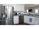 Modern kitchen with stainless steel appliances, granite countertops, and wooden floors at 2205 Philadelphia Church Rd, Dallas, NC 28034