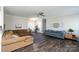 Comfortable living room with hardwood floors, ample seating, and bright, natural light at 2205 Philadelphia Church Rd, Dallas, NC 28034