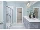 Elegant bathroom with a glass-enclosed shower, double vanity, and neutral color palette at 2512 Mabel Ln, Monroe, NC 28110
