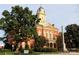 Historical courthouse building with red brick, clock tower, and manicured landscaping at 2512 Mabel Ln, Monroe, NC 28110