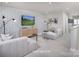 Loft featuring comfortable seating, a modern entertainment unit, and stylish decor at 2512 Mabel Ln, Monroe, NC 28110