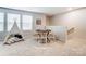 Cozy bonus room with game table, and comfortable seating area perfect for relaxation or entertaining at 2526 Mabel Ln, Monroe, NC 28110