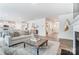 Open-concept living room with a comfortable couch, stylish decor, and seamless flow to other spaces at 2526 Mabel Ln, Monroe, NC 28110
