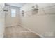 Spacious walk-in closet includes shelving for optimal organization at 2526 Mabel Ln, Monroe, NC 28110
