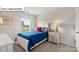 Bright bedroom featuring a bed, side table, and a window view at 2905 Penninger Cir, Charlotte, NC 28262
