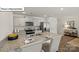 Modern kitchen featuring granite countertops, stainless steel appliances, and a breakfast bar at 2909 Penninger Cir, Charlotte, NC 28262