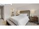 This bedroom features neutral decor, a walk in closet, and an ensuite bathroom at 2917 Penninger Cir, Charlotte, NC 28262
