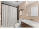 Full bathroom featuring a shower/tub combo, sleek vanity and neutral tones at 2933 Hilliard Dr, Charlotte, NC 28205