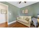 Office with hardwood floors, a love seat and neutral wall color at 2933 Hilliard Dr, Charlotte, NC 28205