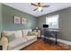 Office with hardwood floors, a love seat, desk and neutral wall color at 2933 Hilliard Dr, Charlotte, NC 28205