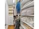 Walk-in closet with custom shelving and ample storage space for clothes and accessories at 2933 Hilliard Dr, Charlotte, NC 28205