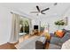 The living room offers a seamless transition to the kitchen and dining areas at 2933 Hilliard Dr, Charlotte, NC 28205
