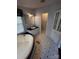 Bathroom with tub, vanity and medicine cabinet at 321 Jennings Rd, Statesville, NC 28625
