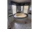 Bathroom featuring a large soaking tub and dual vanities at 321 Jennings Rd, Statesville, NC 28625
