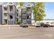 Condominium complex with well-maintained landscaping and convenient parking at 372 Northwest Dr, Davidson, NC 28036