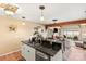 Modern kitchen with granite countertops and seamless view into the living area at 372 Northwest Dr, Davidson, NC 28036