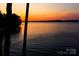 Picturesque sunset lake view, ideal for relaxation and enjoying nature's beauty at 372 Northwest Dr, Davidson, NC 28036