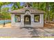 Charming community pavilion with seating, set amongst lush greenery and recreational facilities at 372 Northwest Dr, Davidson, NC 28036