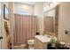 Standard bathroom featuring vanity sink and shower with curtain at 4122 Banfield Pl, Charlotte, NC 28226