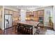 Gourmet kitchen featuring stainless steel appliances, custom cabinets, and an island with a granite countertop at 4122 Banfield Pl, Charlotte, NC 28226