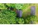 Aerial shot of metal roof and backyard, surrounded by lush trees at 4705 Campground View Rd, Catawba, NC 28609