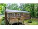Exterior of home with a wood deck, grill, and metal roof at 4705 Campground View Rd, Catawba, NC 28609