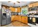 Functional kitchen featuring wooden cabinets, stainless steel appliances, and plenty of counter space at 4705 Campground View Rd, Catawba, NC 28609