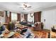Relaxing living room with a ceiling fan, large rug, and a comfortable seating area with lots of natural light at 4705 Campground View Rd, Catawba, NC 28609