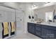 Modern bathroom with double vanity, a glass-enclosed shower and modern fixtures at 5201 Shasta St # 5201, Gastonia, NC 28052