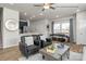 Inviting living area featuring modern decor, an open layout to the dining area, and ample natural light at 5201 Shasta St # 5201, Gastonia, NC 28052