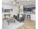 Open-concept living area flowing into a modern kitchen, with sleek countertops and stainless steel appliances at 5201 Shasta St # 5201, Gastonia, NC 28052