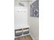 Charming mudroom with a built in bench, hooks, and decorative blue tile at 5201 Shasta St # 5201, Gastonia, NC 28052