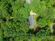 An aerial view of a home surrounded by mature trees, a peaceful setting for a homeowner who values privacy at 532 Courtney Ln, Matthews, NC 28105