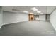 Finished basement with fireplace and carpet at 532 Courtney Ln, Matthews, NC 28105