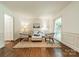 Cozy living room with neutral furniture, hardwood floors, and natural light at 532 Courtney Ln, Matthews, NC 28105